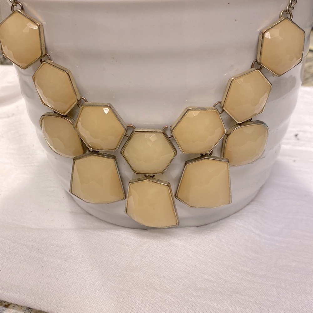 Cream statement necklace.